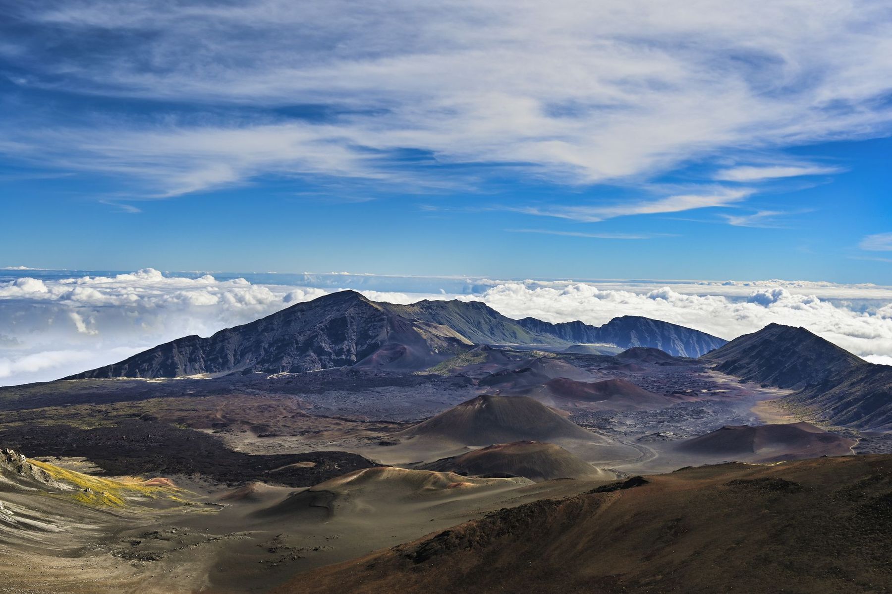 The crater landscape of Haleakalā on Maui above the clouds