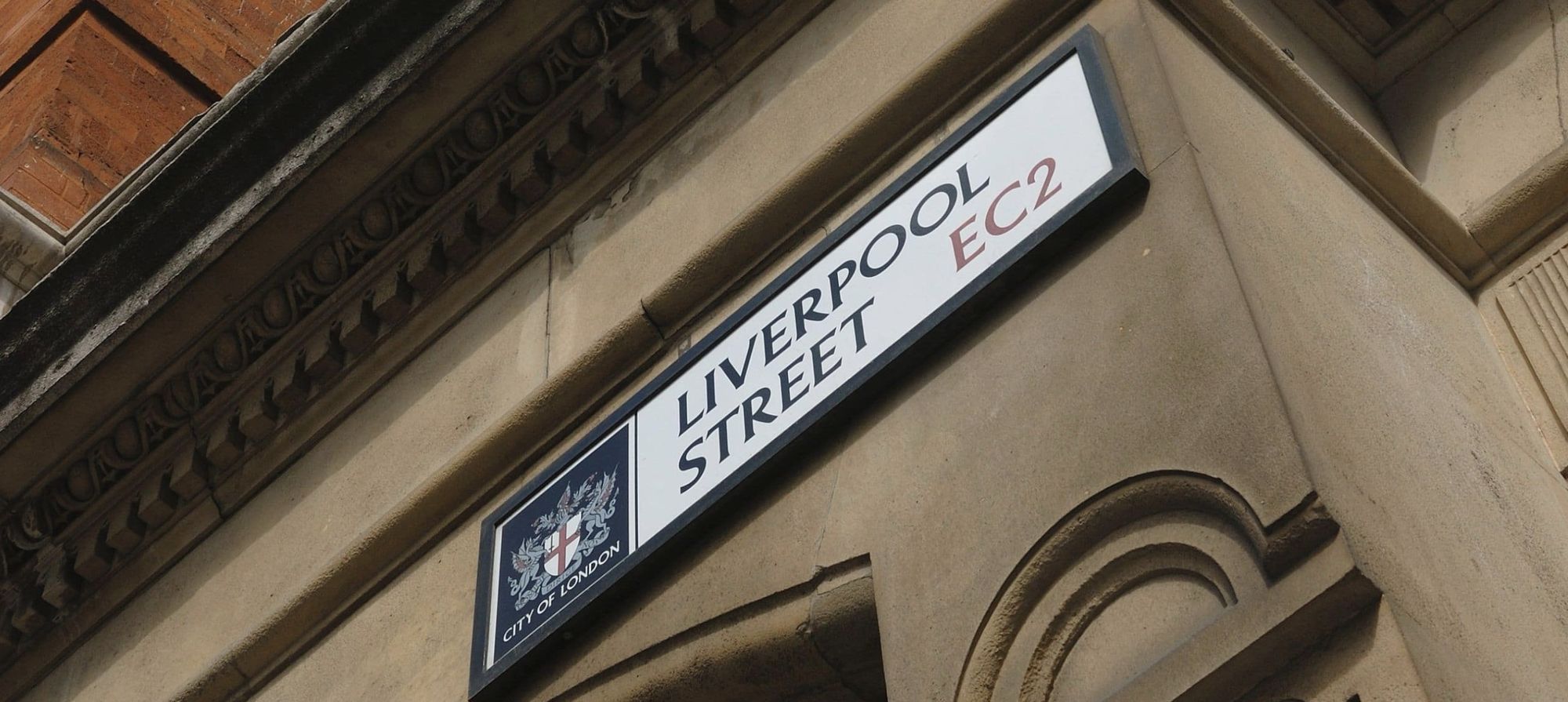 The Liverpool Street sign on the corner of the building