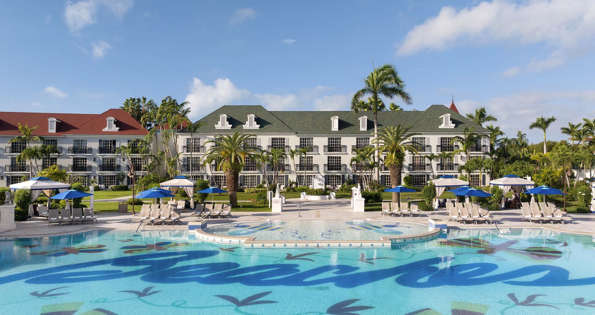 The main pool at Beaches Turks & Caicos, with the Beaches name in the tiles