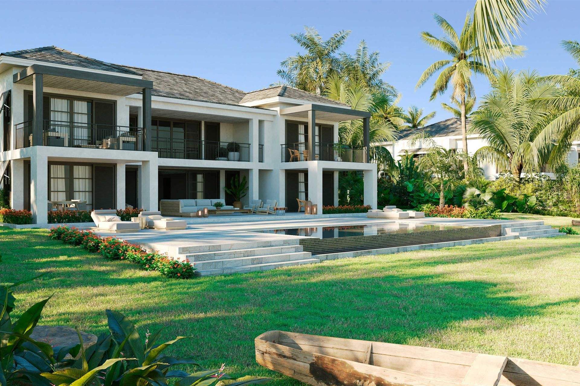 A two-story villa with its own pool and lawn