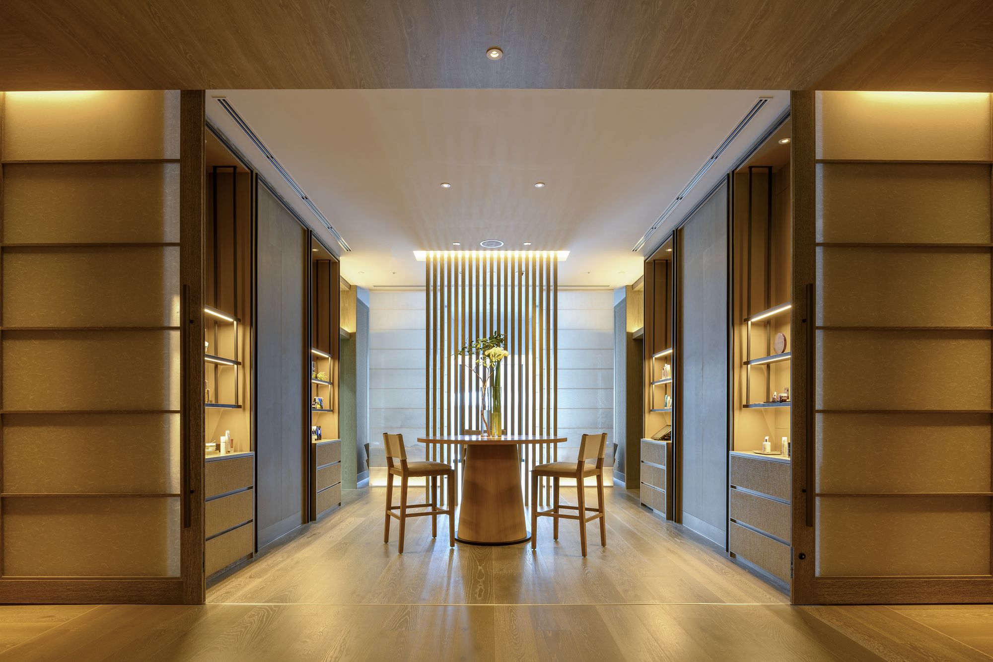 A calm spa corridor in pale wood