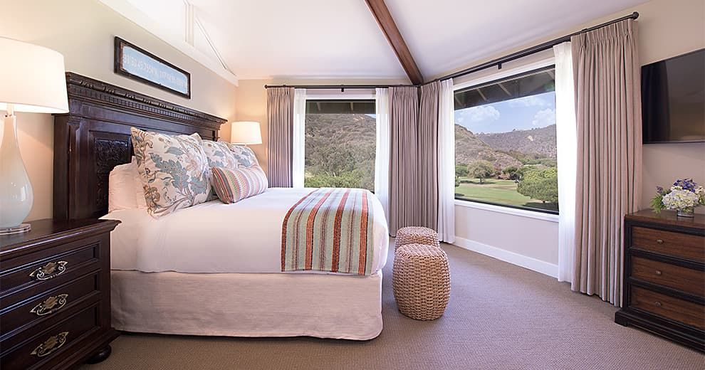 The Treehouse bedroom, with windows onto the hills