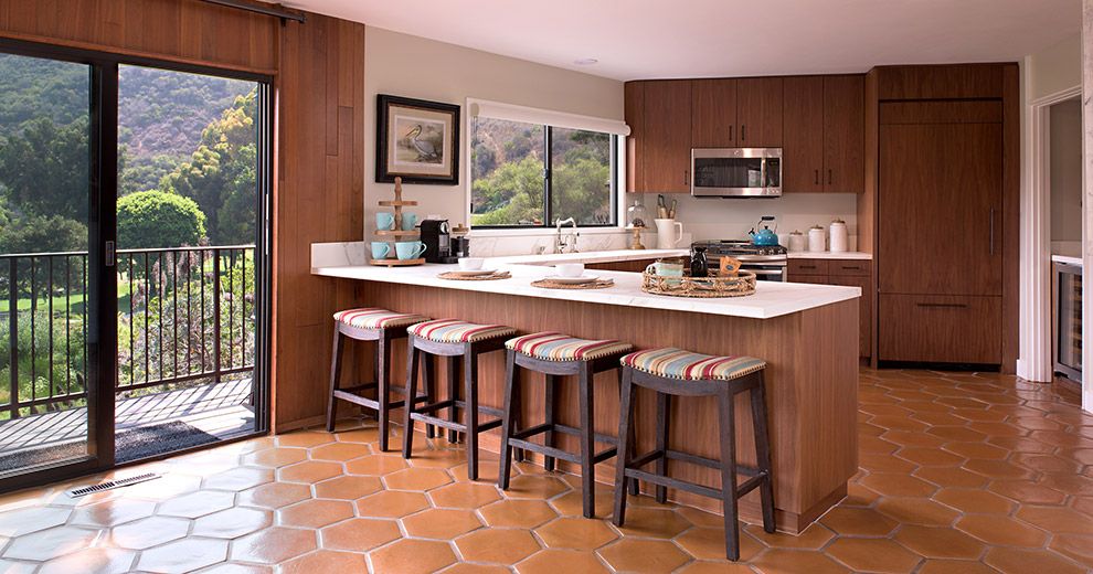 The Treehouse kitchen with terracotta floors and a balcony